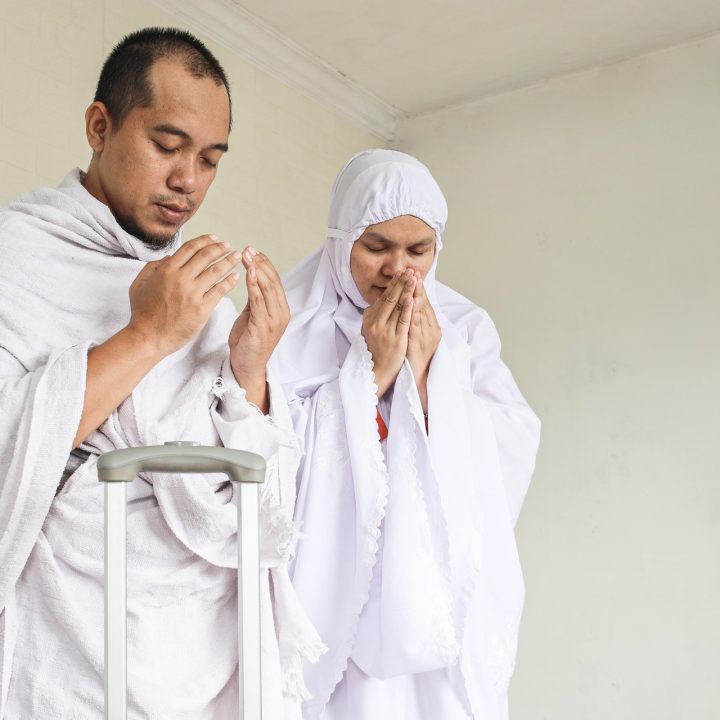 muslim-couple-praying-before-umrah-or-hajj-2023-11-27-05-29-13-utc.jpg